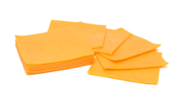 istock cheese slices isolated on the white background 522372656