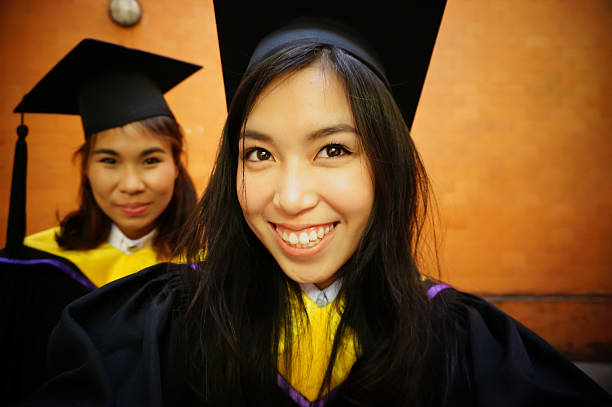 istock graduated girl selfie 522373482
