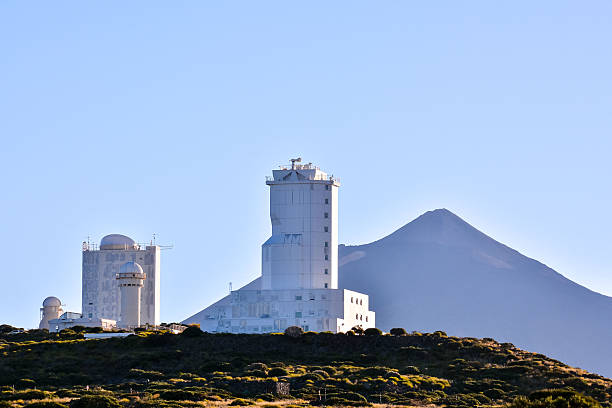 Telescopes of the Teide Astronomical Observatory Telescopes of the Teide Astronomical Observatory in Tenerife, Spain. observatory tenerife canary islands el teide national park stock pictures, royalty-free photos & images