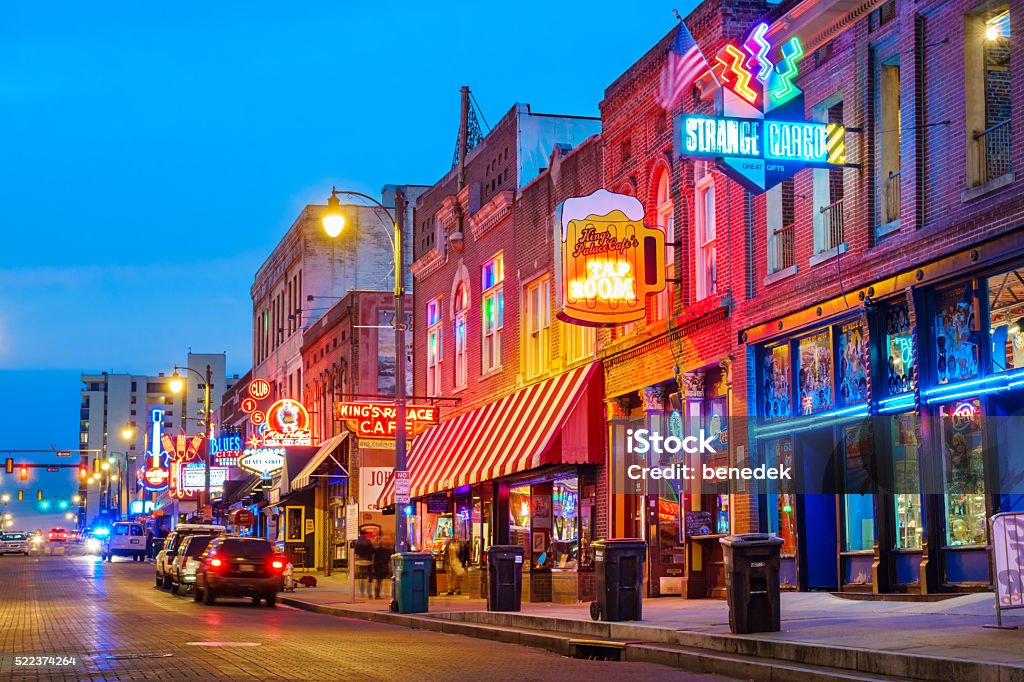 Beale Street Music District in Memphis Tennessee USA Photo of colorful cafe bars at the iconic Beale Street music and entertainment district of downtown Memphis, Tennessee, USA, illuminated at night. Memphis - Tennessee Stock Photo