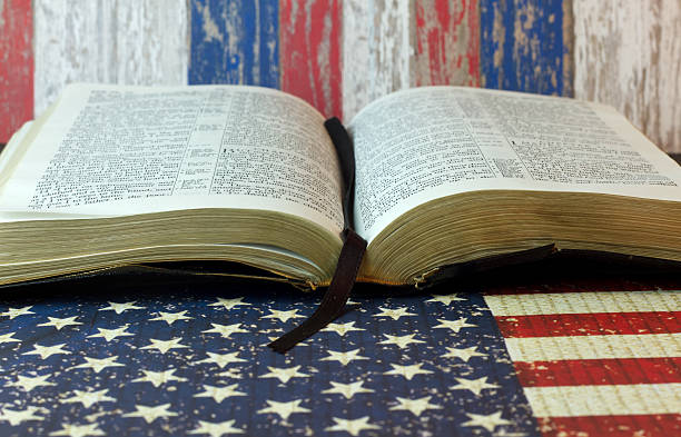 istock Holy Bible against an American Flag 522374522