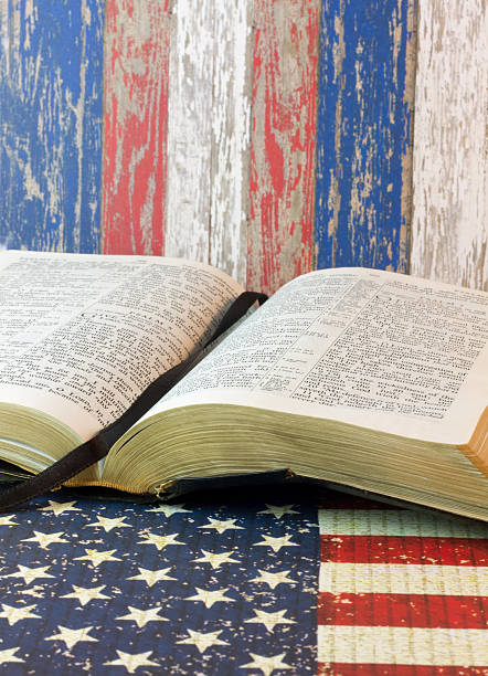 istock Open Bible on a Red, white and blue background 522374566