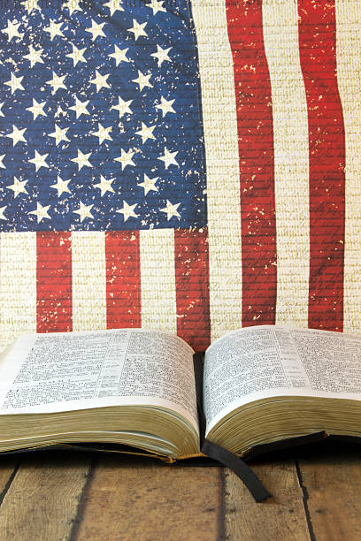 istock Open Bible on a Red, white and blue background 522374582
