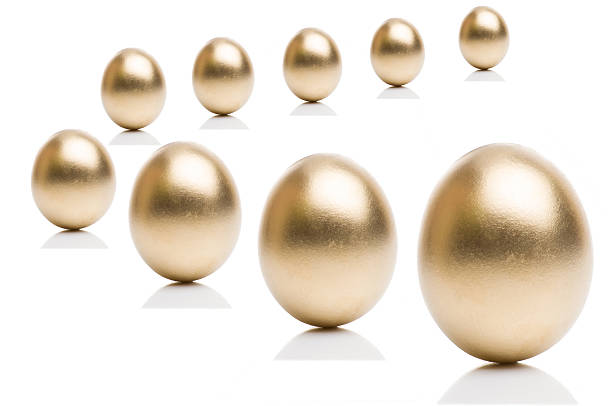 istock Golden eggs from  isolated on a white background. 522374984