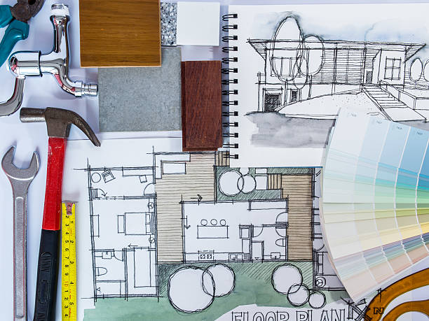 istock Concept of  home renovation with architecture drawing and work tools 522378695