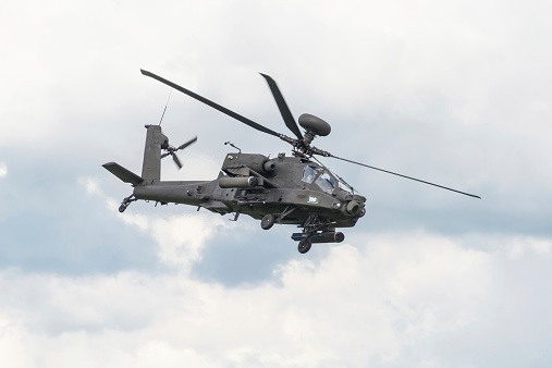 Cosford, UK - 8 June 2014: A British Army Apache helicopter, displaying at the RAF Cosford Airshow.