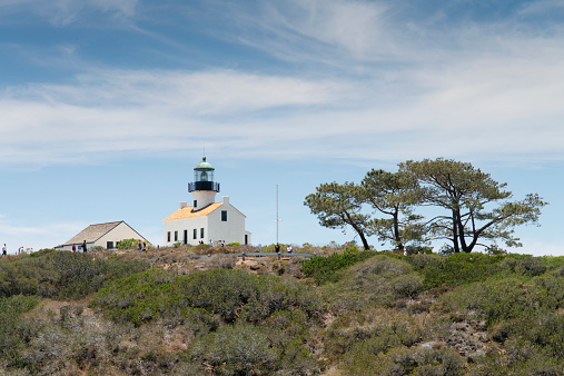 San Diego, California, USA - June 1, 2014: People visiting the old Point Loma Lighthouse near San Diego, California, during the day.
