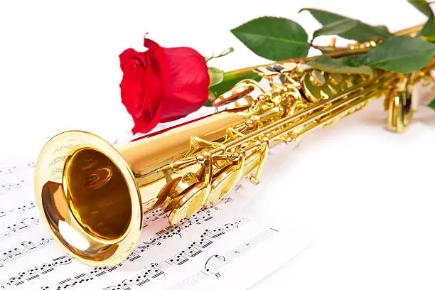 Photo of Musical notes and saxophone