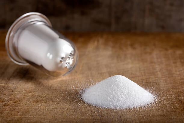 istock Spilled salt onwood 522380178