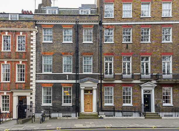 Typical London street and buildings Typical London street and buildings window chimney london england residential district stock pictures, royalty-free photos & images