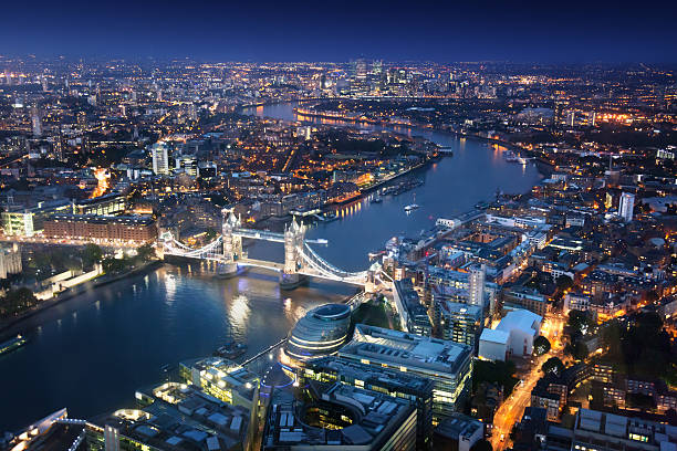 istock London at night with urban architectures and Tower Bridge 522380379