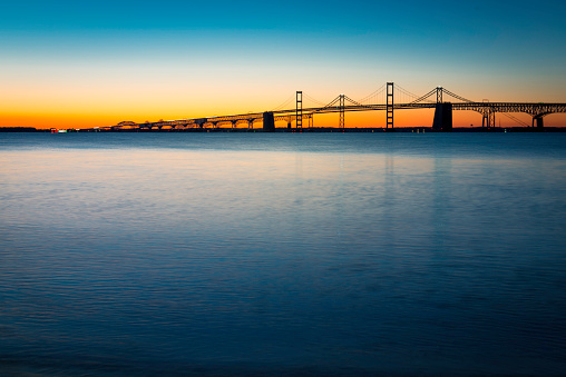 The Chesapeake Bay Bridge just before sunrise as viewed from Sandy Point State Park