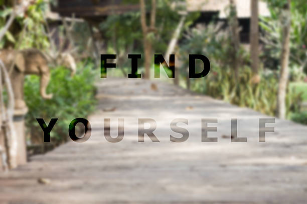istock Find yourself inspirational quote on garden background 522382780