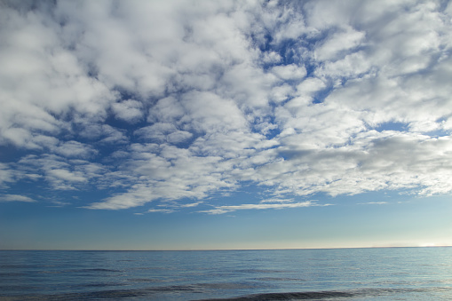 Cloudscape with stratocumulus clouds over horizon