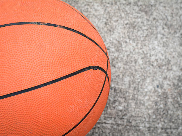 istock Orange basketball on the floor 522384930