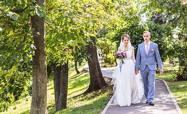 istock Nice young wedding couple outdoors 522387144