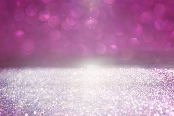 istock glitter vintage lights background. pink and silver 522387936