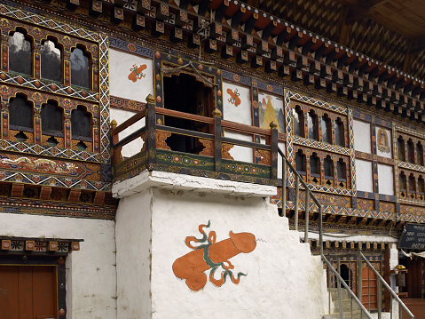 Fertility symbols on a row of houses in the town of Paro in the Kingdom of Bhutan.
