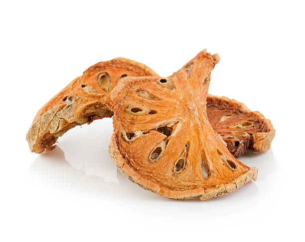 istock Dried quince isolated on white background 522388514