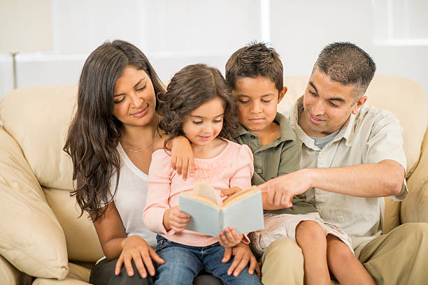 istock Reading a Book Together as a Family 522388524