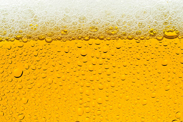 istock Bubble of beer in glass 522389362