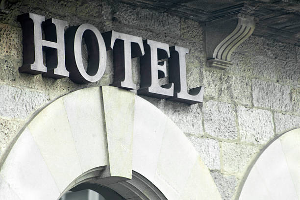 istock Hotel sign on a stone building facade. 522389696