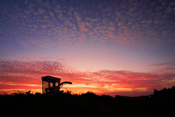 istock Kiwi Farm Machinery At Sunset 522390826