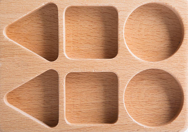 istock Baby sorter with geometric figures from wood on white isolated 522391182