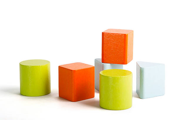 Baby sorter with geometric figures from wood on white isolated