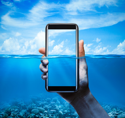 half of the Mobile phone under water, water-resistant scene