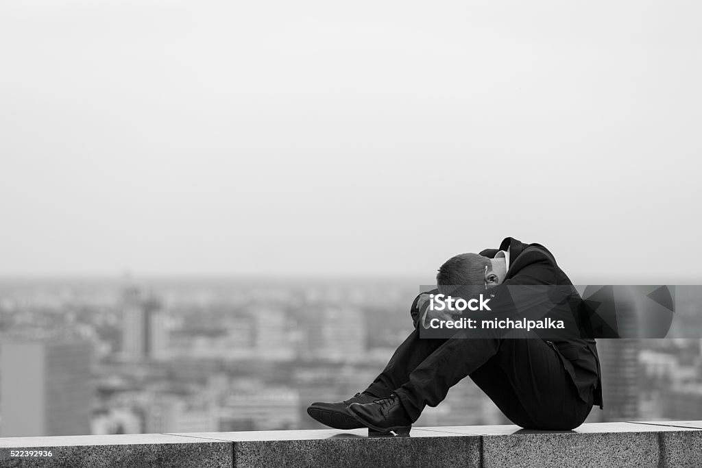 Depression Hopeless young businessman Depression - Sadness Stock Photo