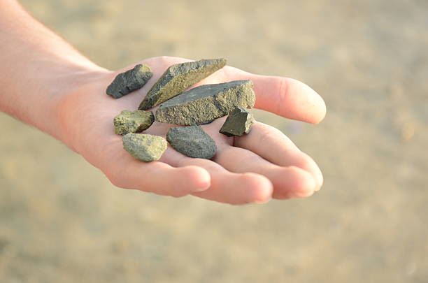 istock Close-up of rock collection on child's hand 522394320