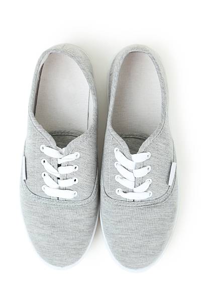 istock Pair of grey shoes isolated on white 522394540