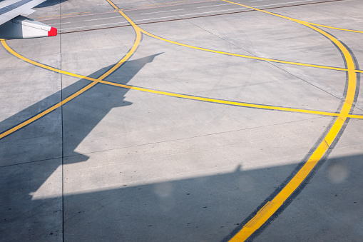 Airport Runway,shadow, red, gray, airplane wing, yellow,Nikon D3x