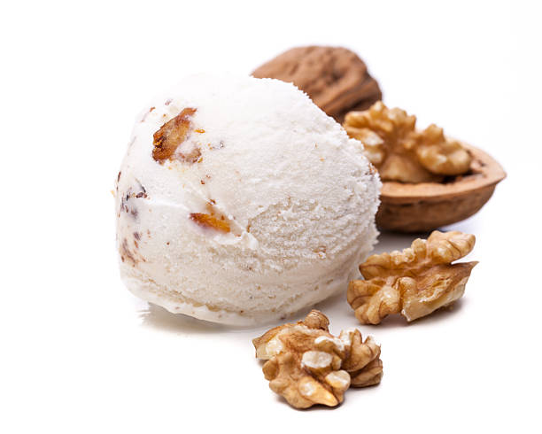 istock single walnut ice cream scoop with nuts on a white 522395508