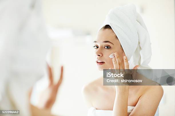 Pampering Cream Stock Photo - Download Image Now - Moisturizer, Women, Human Face
