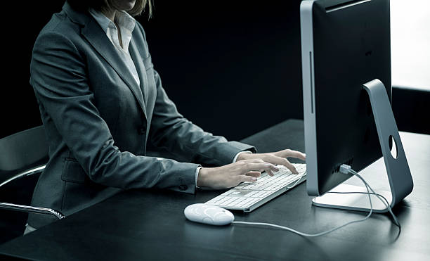 istock Businesswoman typing at computer 522397221