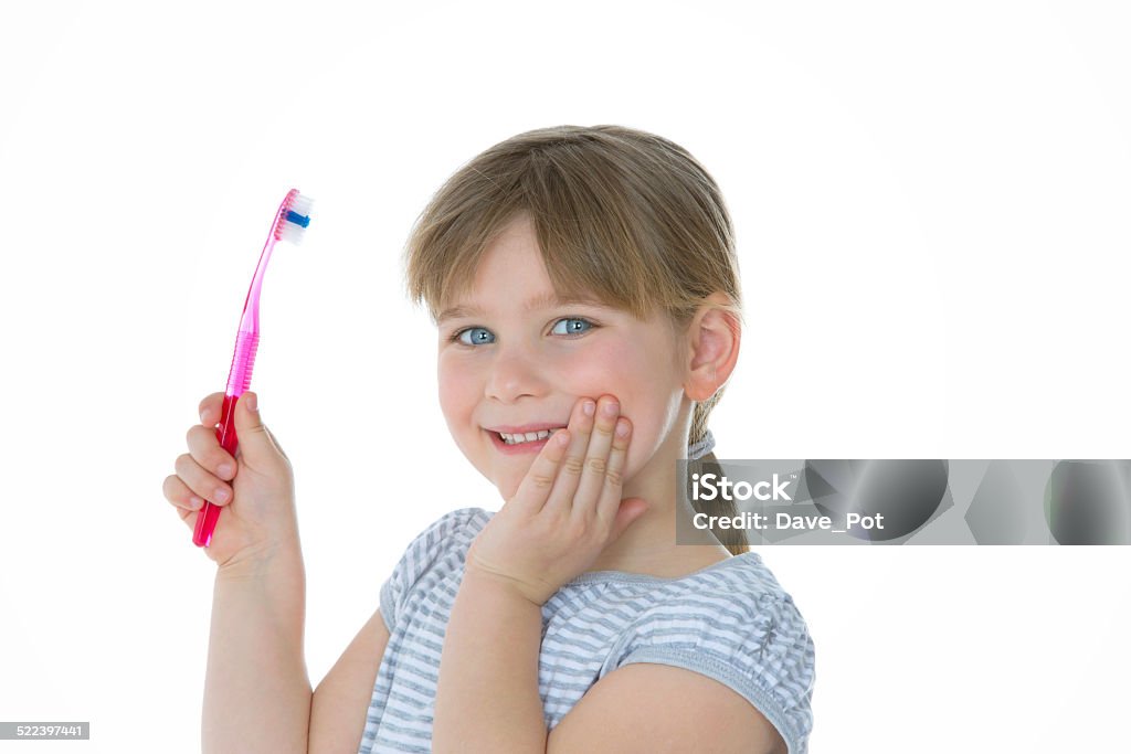 child nice to clean my teeth closeup of beautiful girl with toothbrush Adult Stock Photo