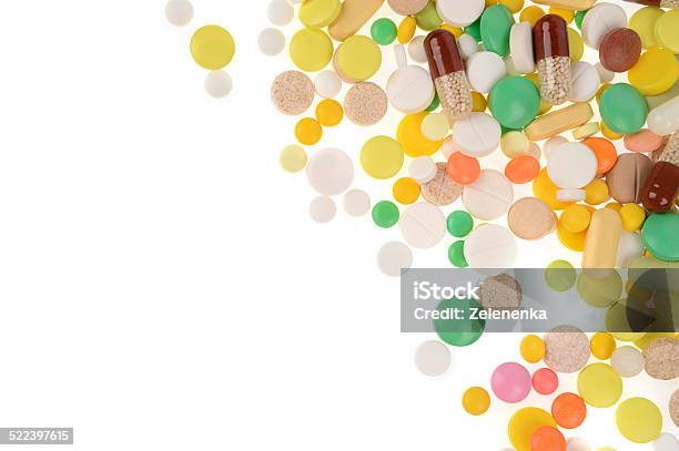 Stack Of Different Pills In Blisters Isolated On White Backgroun Stock Photo - Download Image Now
