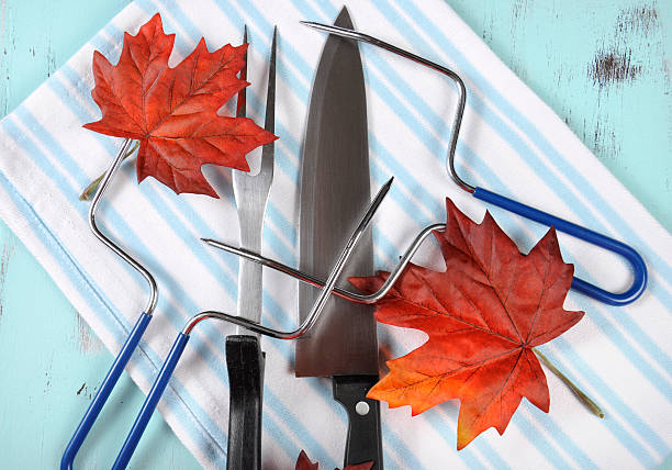 istock Thanksgiving roast turkey carving utensils set 522398041