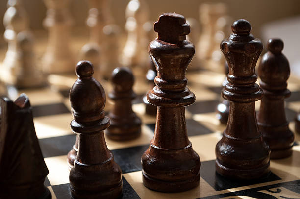 istock wooden chess on board 522398474