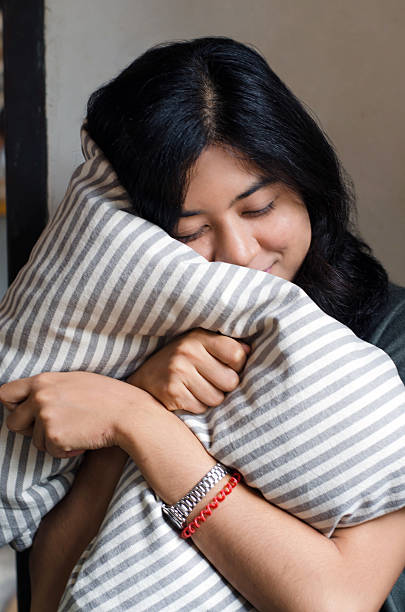 istock Cute girl resting on soft pillow 522399151