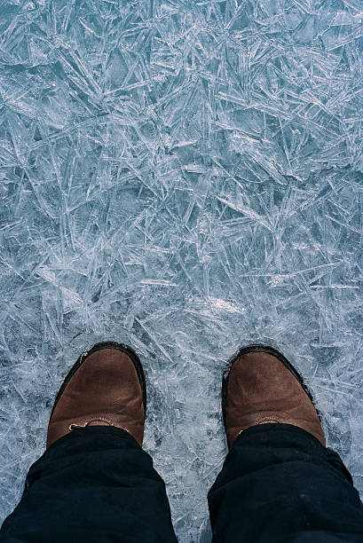 istock The legs on the ice. 522400594