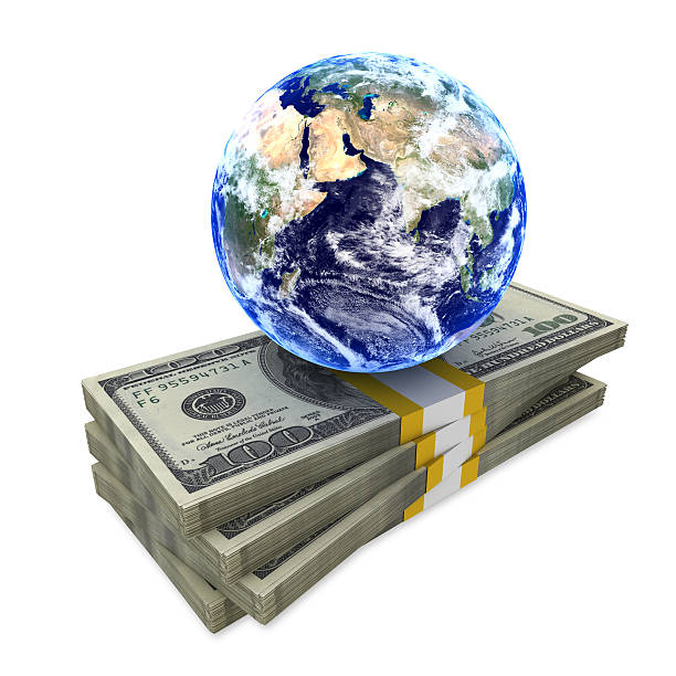 istock Earth on money (Elements of this image furnished by NASA) 522402453