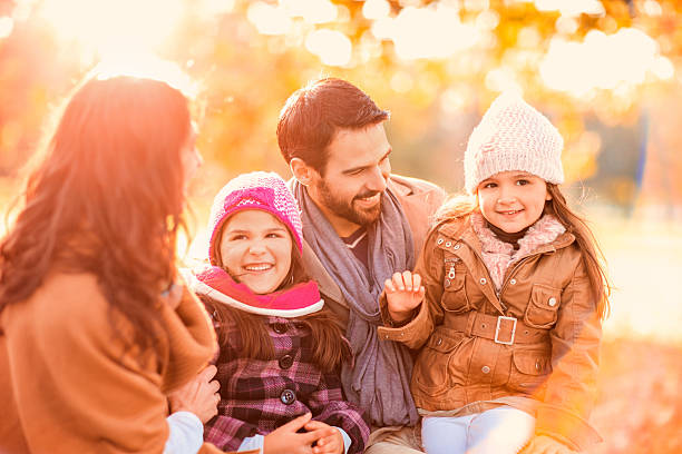 istock Family in the park at sunset. 522402615