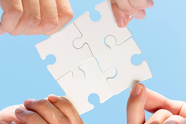 istock puzzle jigsaw and concept with sky background 522402803