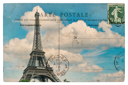 antique french postcard from paris with eiffel tower over blue sky