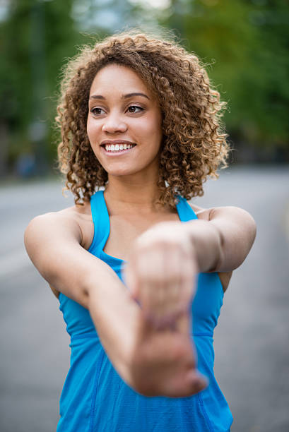 istock Sports woman stretching 522403663