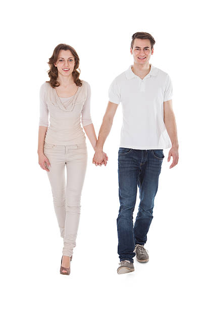 istock Couple In Casuals Walking Over White Background 522404297