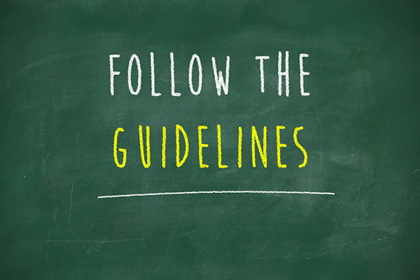 Follow the guidelines handwritten on blackboard stock photo